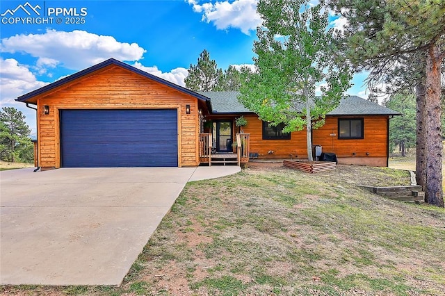 view of front of property with a garage