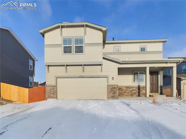 view of front of home featuring a garage and a porch