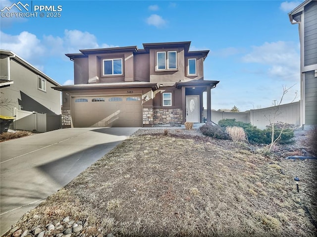 view of front of property featuring a garage