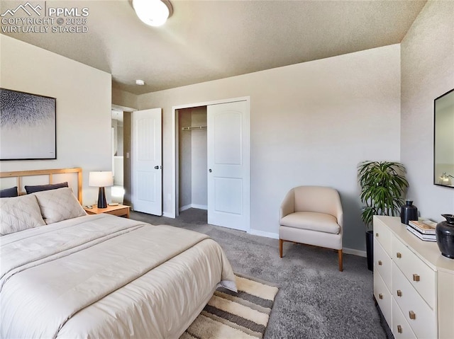 carpeted bedroom featuring a closet