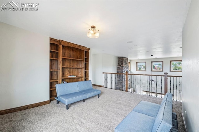 living area featuring carpet flooring