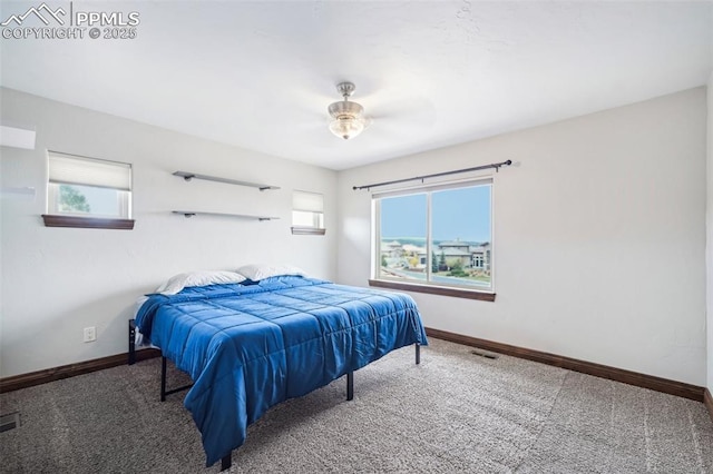 carpeted bedroom featuring ceiling fan