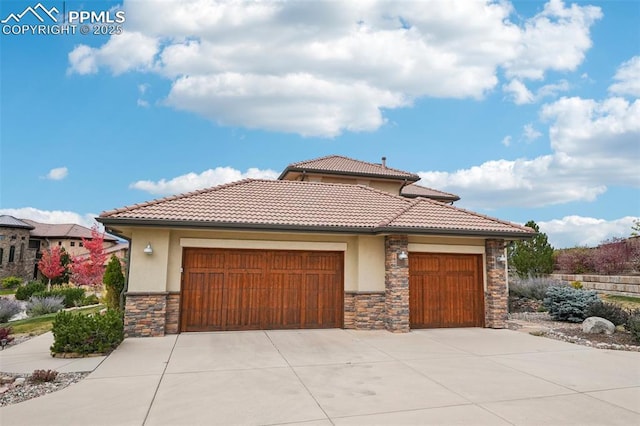 view of front of property featuring a garage