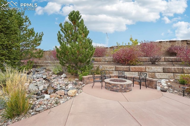 view of patio featuring a fire pit