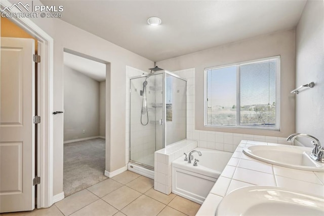 bathroom featuring vanity, tile patterned flooring, and independent shower and bath