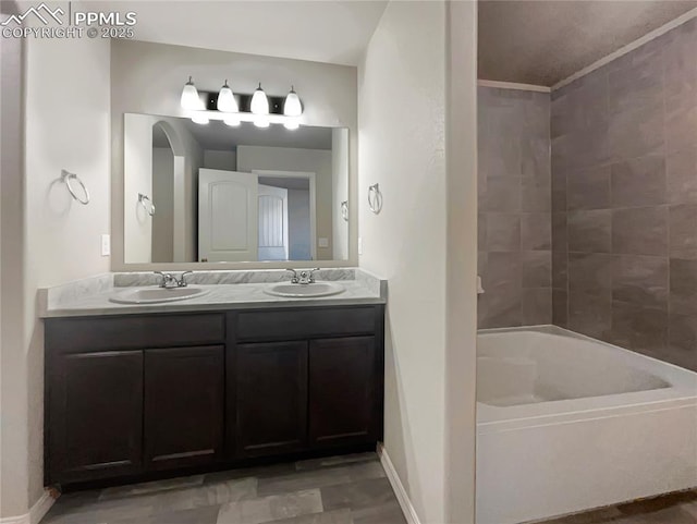 bathroom with hardwood / wood-style floors and vanity