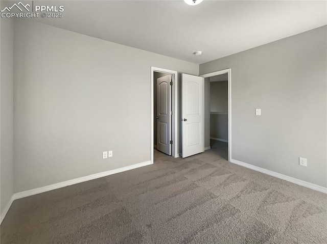 unfurnished bedroom with carpet flooring