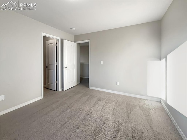 unfurnished bedroom with light carpet