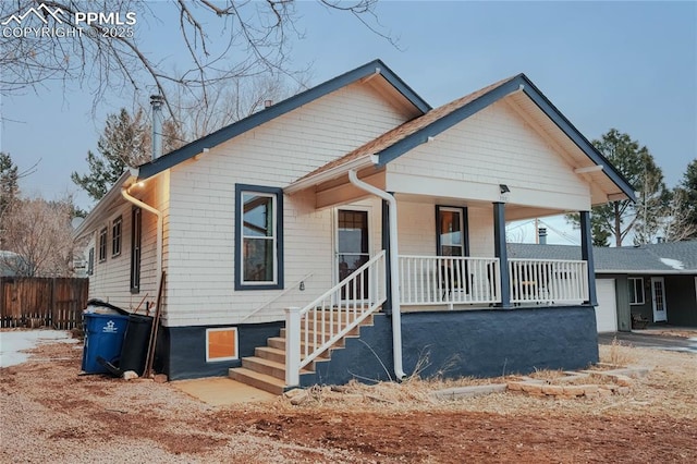 view of front of property featuring covered porch