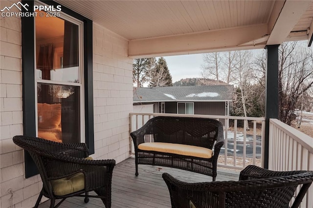 view of snow covered deck