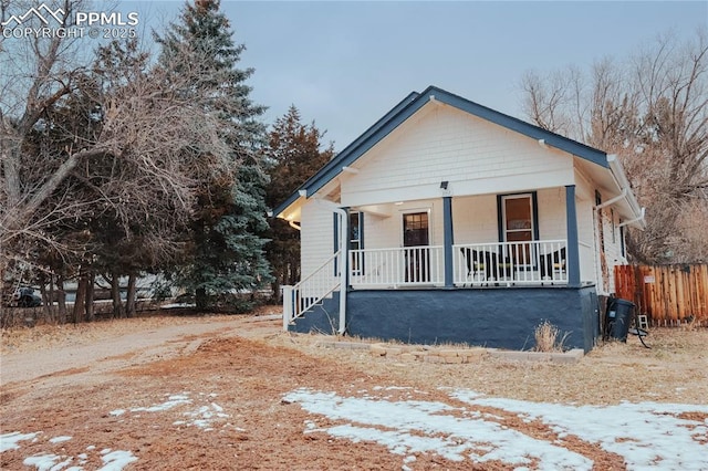 bungalow-style home featuring covered porch