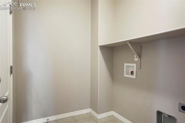 laundry room with washer hookup, hookup for an electric dryer, and light tile patterned flooring