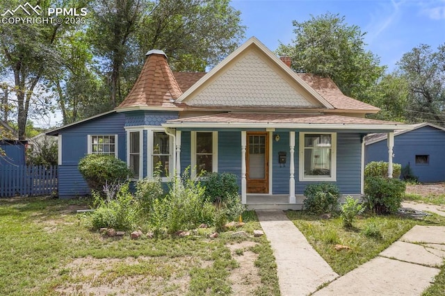 view of front of property with a front lawn and a porch