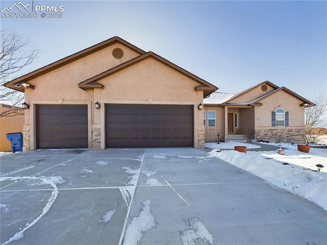 ranch-style house featuring a garage