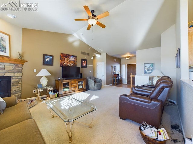 carpeted living room with ceiling fan, lofted ceiling, and a fireplace