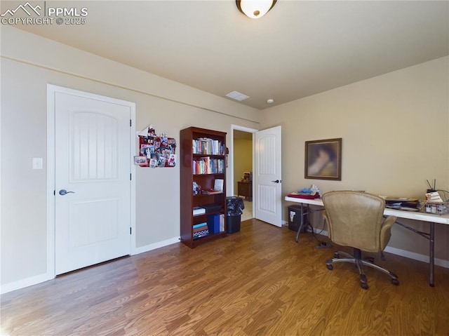 office with hardwood / wood-style floors