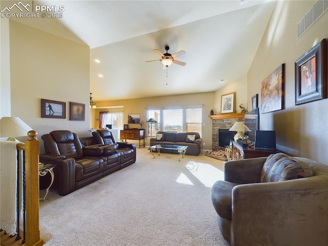 living room featuring ceiling fan, a fireplace, carpet floors, and high vaulted ceiling