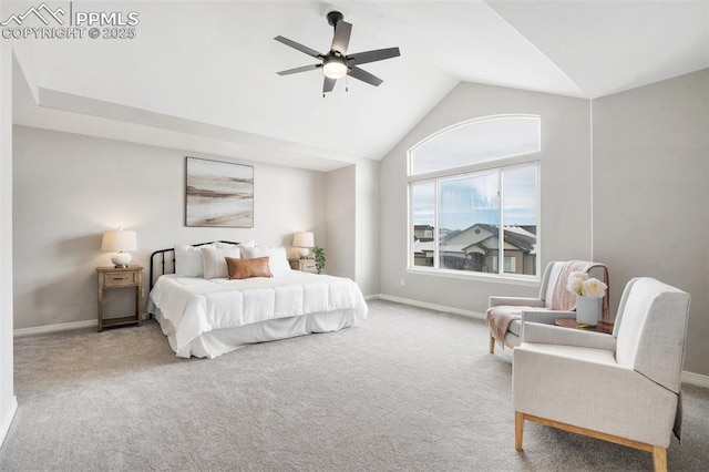 carpeted bedroom with ceiling fan and lofted ceiling