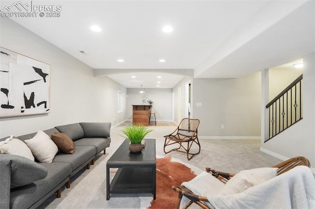 living room featuring light carpet