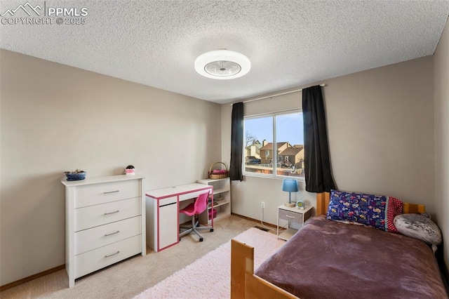 carpeted bedroom with a textured ceiling