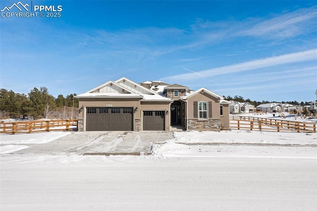 view of front of property featuring a garage