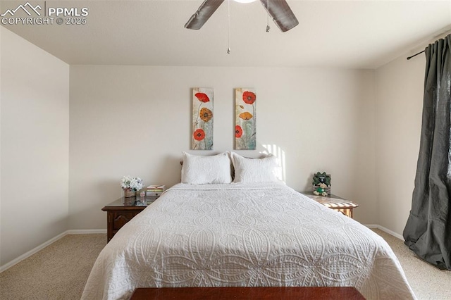 carpeted bedroom featuring ceiling fan and baseboards