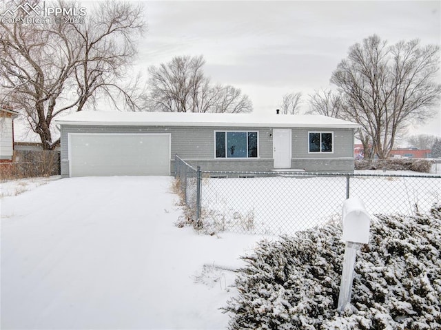 ranch-style home with a garage