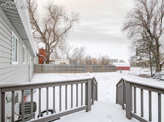 view of snow covered deck