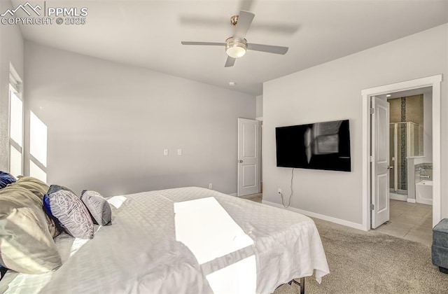 carpeted bedroom featuring connected bathroom and ceiling fan