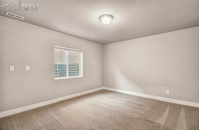 unfurnished room with carpet floors