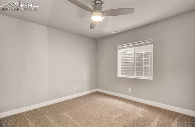 empty room featuring ceiling fan and carpet flooring