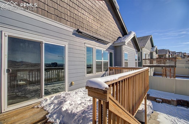 view of snow covered deck