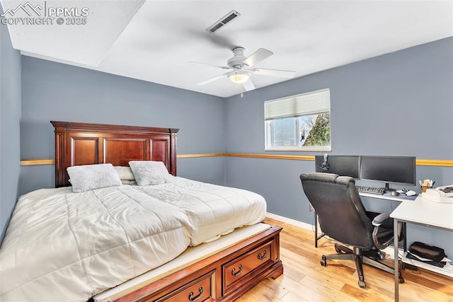 bedroom featuring ceiling fan and light hardwood / wood-style floors