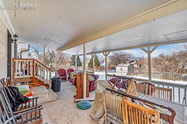 view of snow covered patio