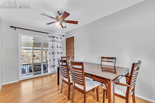 dining space with ceiling fan and light hardwood / wood-style floors