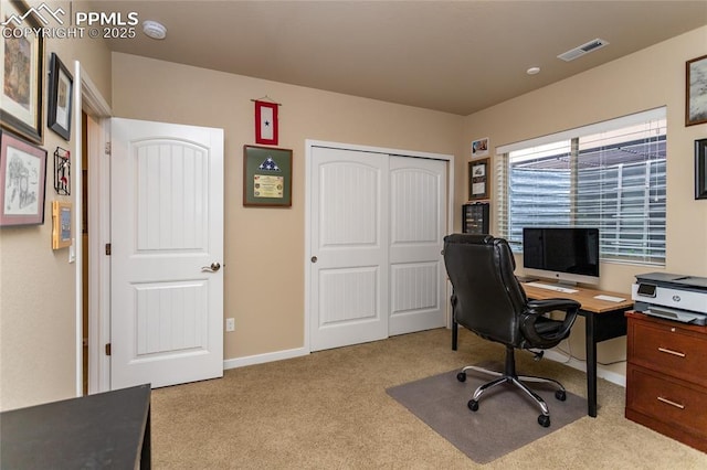 office area with light carpet