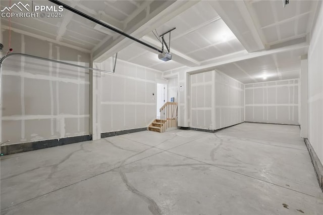 16896 Greenfield Dr, Monument, CO 80132 - garage featuring a garage door opener