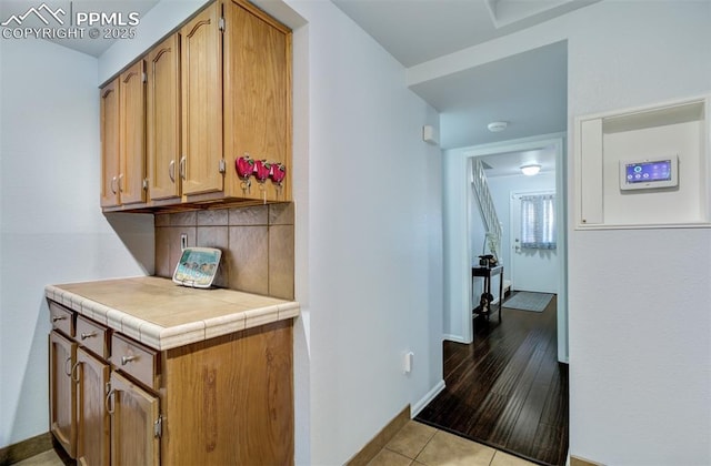 interior space featuring light tile patterned floors