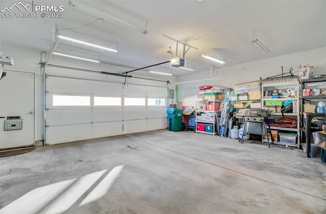 garage featuring a garage door opener