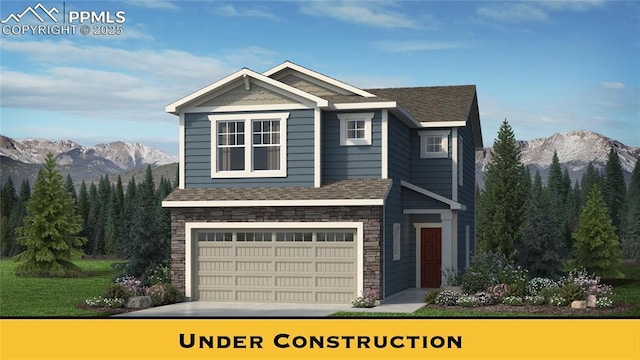 view of front of home with a garage and a mountain view