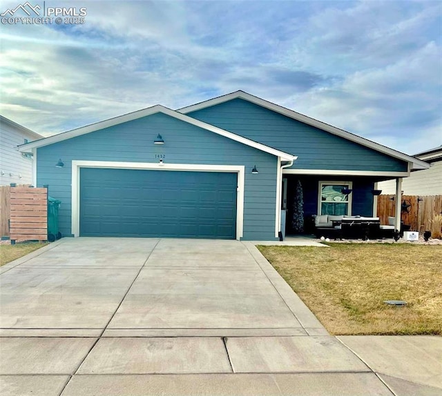 ranch-style house with a garage and a front yard