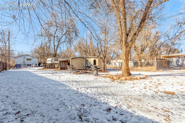 view of snow covered house