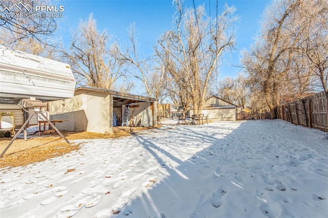 view of snowy yard