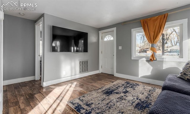 foyer featuring dark hardwood / wood-style floors