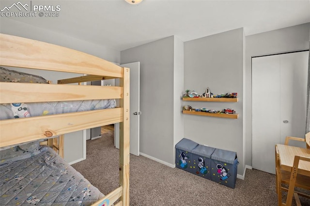 carpeted bedroom with a closet