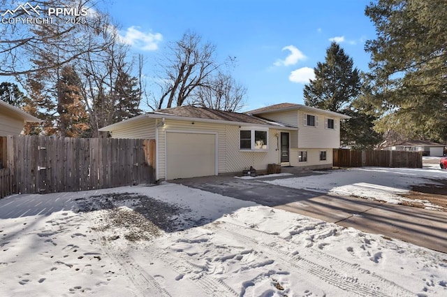 tri-level home featuring a garage