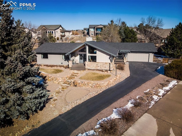 view of front of property featuring a garage