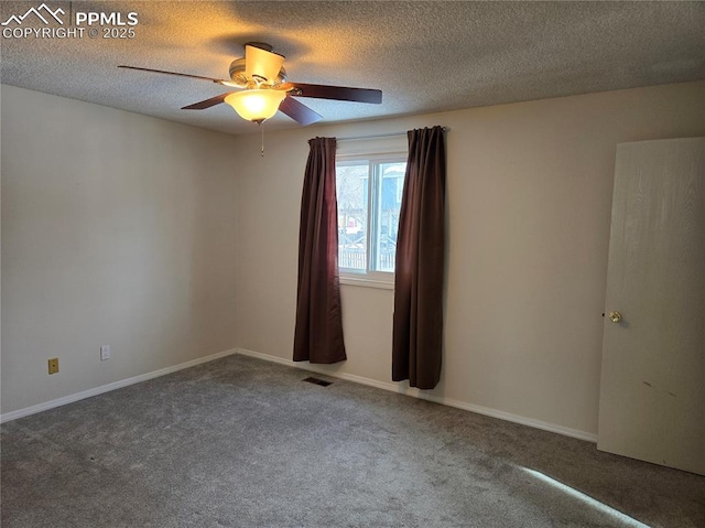 unfurnished room with ceiling fan, a textured ceiling, and carpet floors