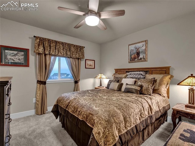 bedroom with ceiling fan and light colored carpet