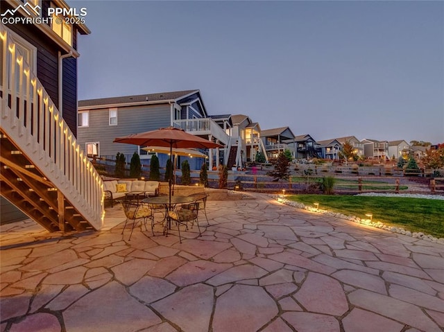 view of patio terrace at dusk